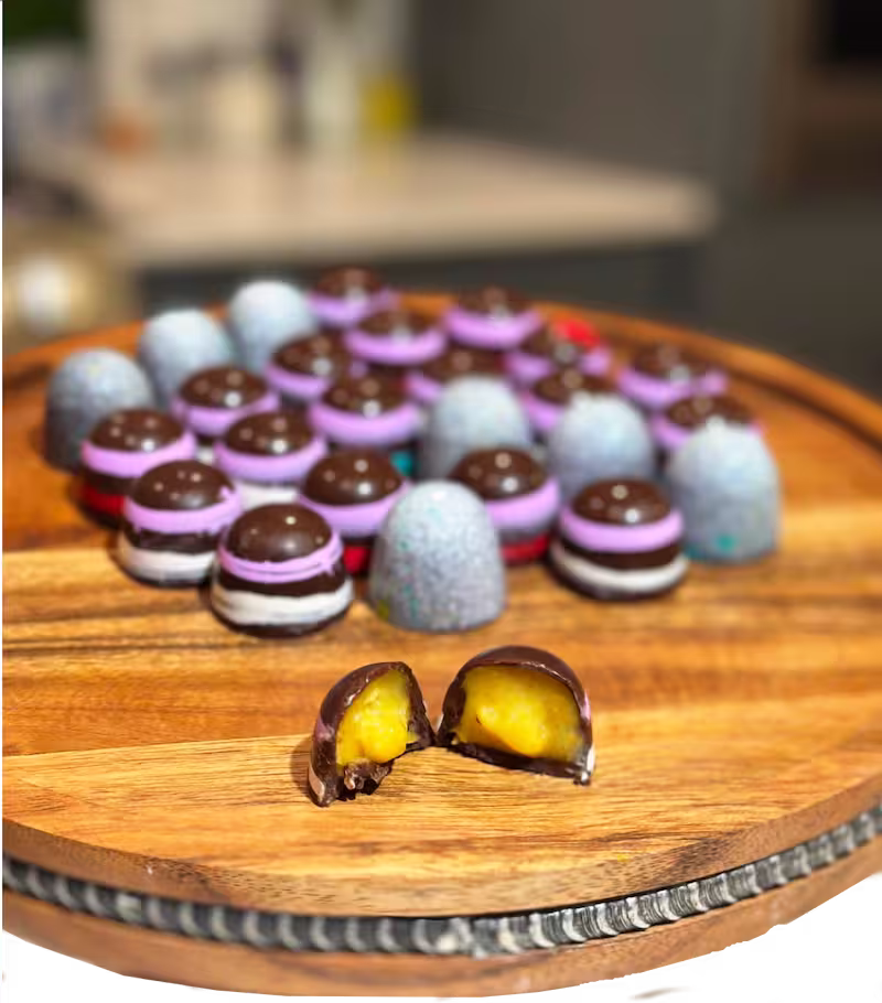 Handcrafted bonbons with silky golden filling